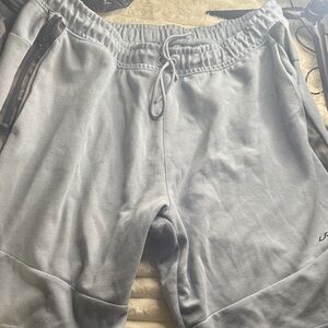 UA Men's Athletic Shorts in Light Gray